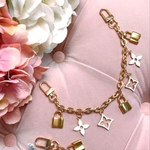 BLANC FLEUR PADLOCK HANDBAG CHARM